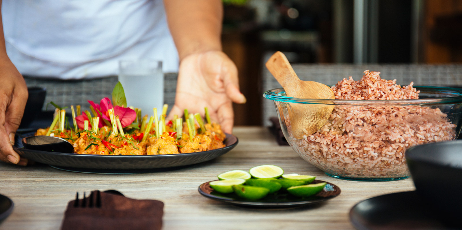 a chef presents some lovely dishes in a Bali villa