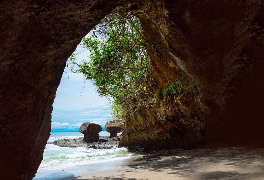 Natural cave on the ocean in Bali