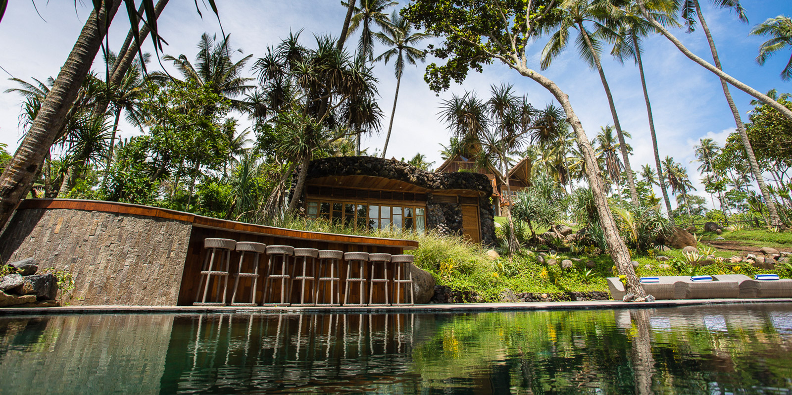 large swimming pool and bar on a Bali luxury villa