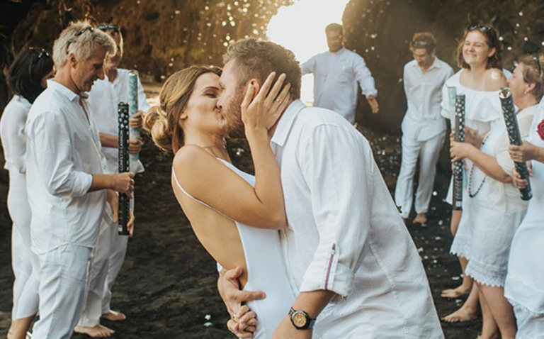 Newlywed couple's first kiss