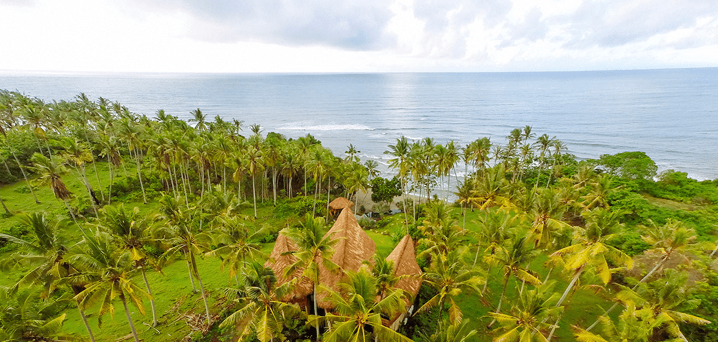 an exotic three roof structure on the ocean