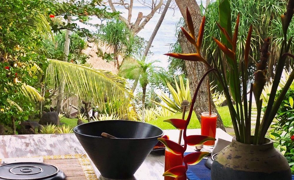 an exotic breakfast with a view of the ocean