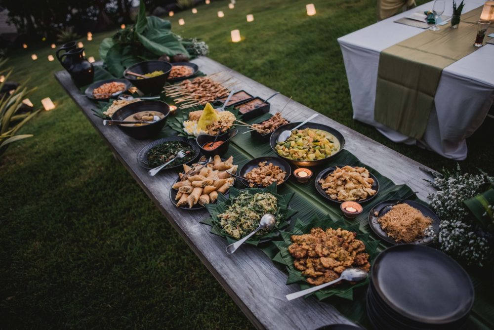 Indonesian food spread with varied dishes