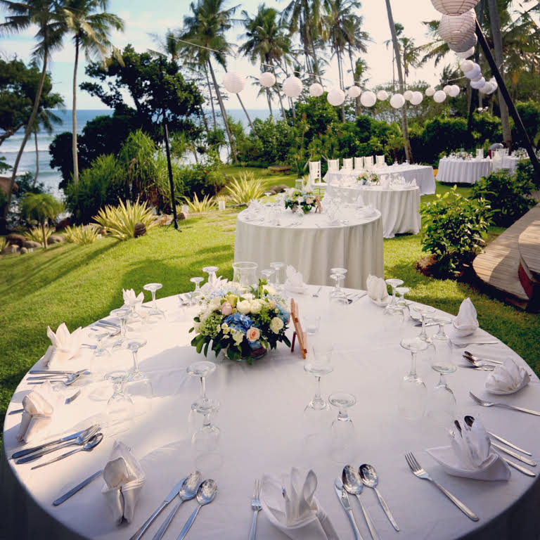 tables on a beach wedding venue in Bali