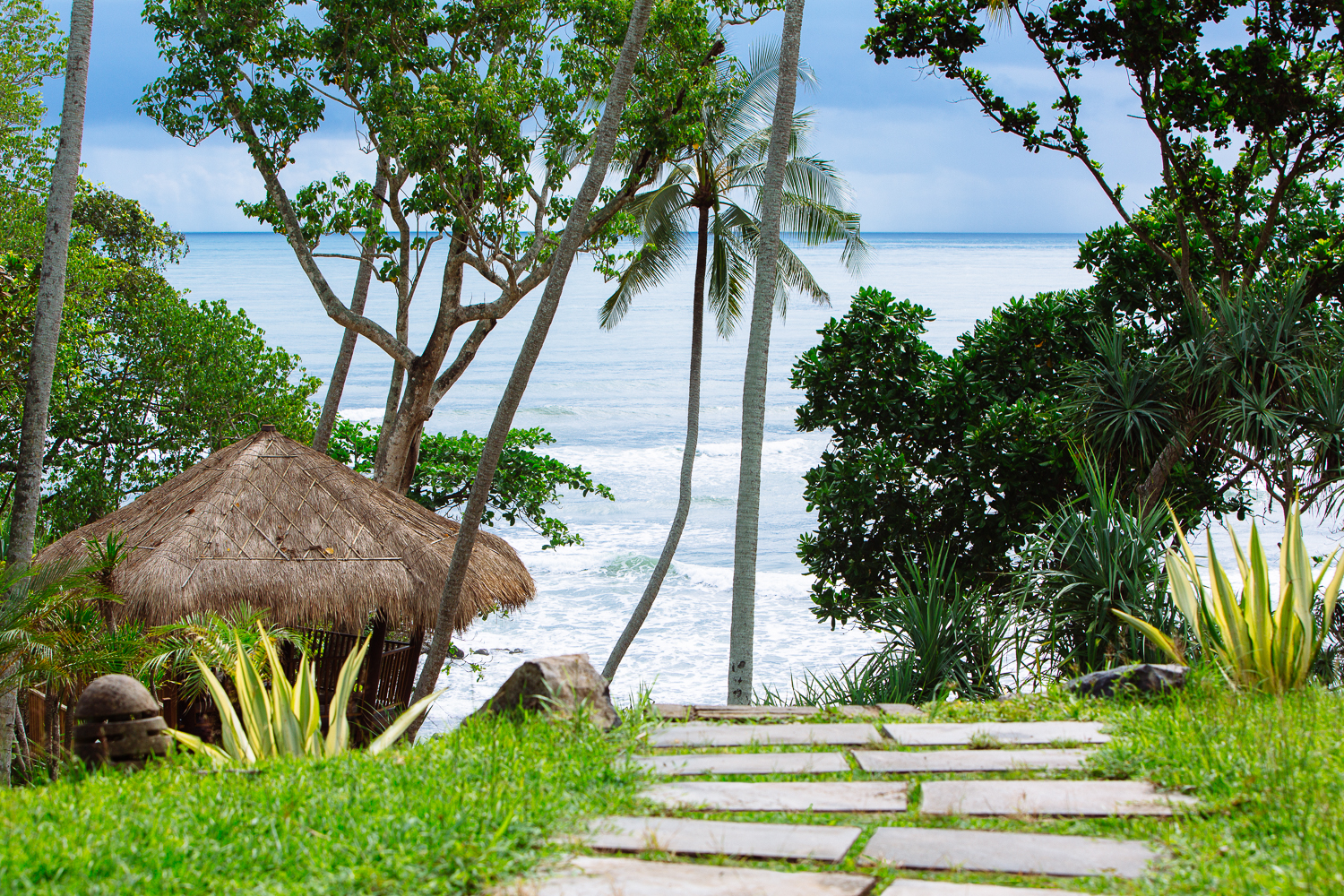 steps towards the beach in a Bali villa